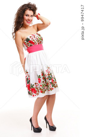 Fashion young woman in summer dress on white 9947417