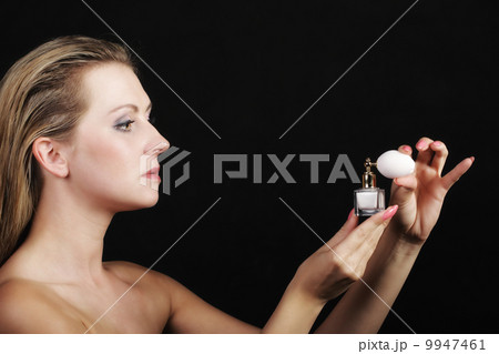portrait beautiful woman with perfume bottle portrait beautiful woman with perfume bottle 9947461