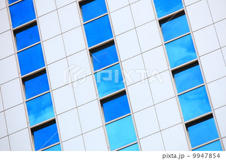 Modern futuristic business building in city Modern futuristic business building in city 9947854