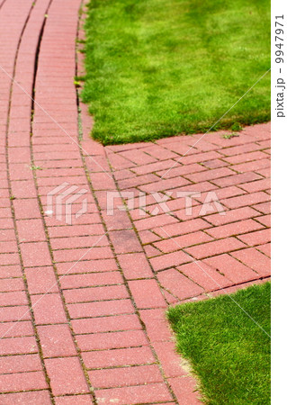 Stone pathway in garden, brick sidewalk 9947971