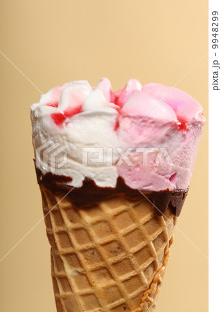 Berry icecream waffle cone on orange Berry icecream waffle cone on orange 9948299