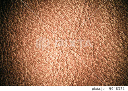 Brown textured leather grunge background closeup Brown textured leather grunge background closeup 9948321
