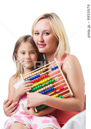 Mother and daughter with abacus on white Mother and daughter with abacus on white 9950974