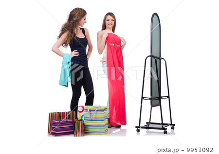 Woman trying new clothing on white 9951092
