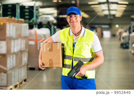 worker scans package in warehouse of forwarding 9952640