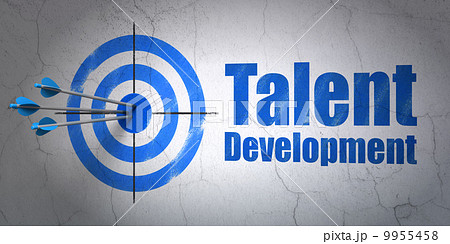 Education concept: target and Talent Development on wall background 9955458