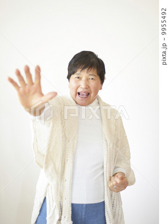 待ってのポーズの写真素材