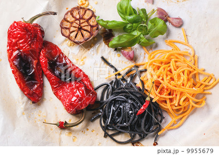Black and orange spaghetti with grilled vegetables Black and orange spaghetti with grilled vegetables 9955679