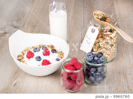 Healthy Breakfast with muesli on textured background Healthy Breakfast with muesli on textured background 9960760