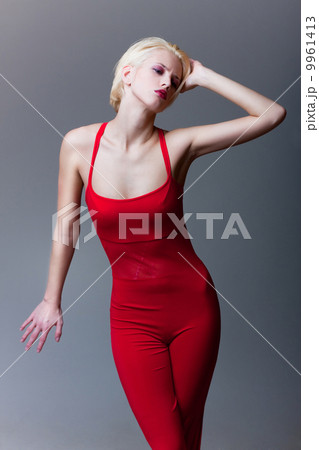 emotive attractive girl in red dress emotive attractive girl in red dress 9961413
