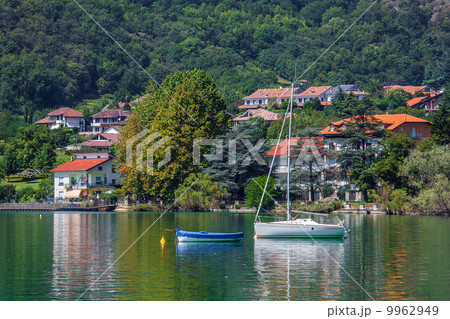 Yacht and small village on Lake Avigliana in Italy. 9962949