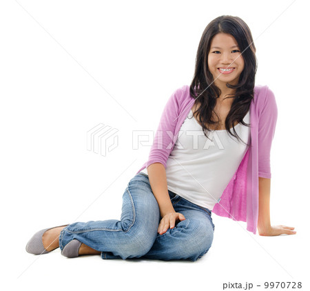 Asian woman sitting on floor Asian woman sitting on floor 9970728