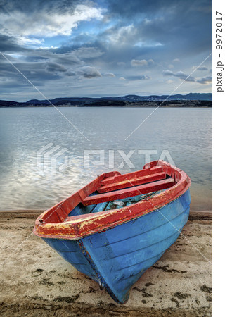 Boat on a lake in the mountains Boat on a lake in the mountains 9972017