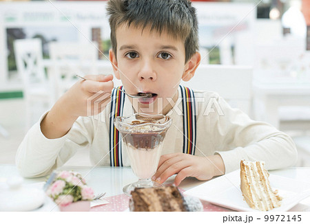 Child eat milk choco shake Child eat milk choco shake 9972145