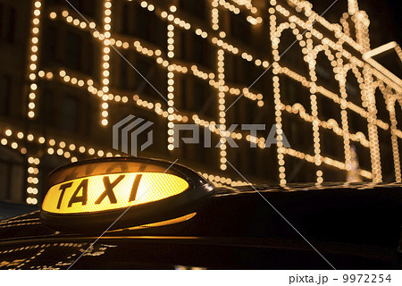 Taxi in London in front of a shopping center 9972254