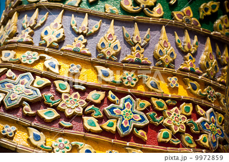 Traditional Thai style pattern at Wat Phra Kaeo, Temple of Emera Traditional Thai style pattern at Wat Phra Kaeo, Temple of Emera 9972859
