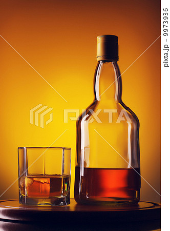Whiskey Bottle and Glass 9973936