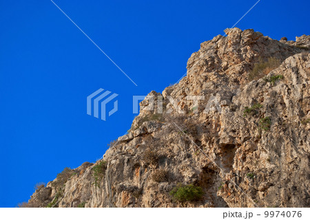 Rock and sky. 9974076