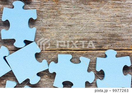 Puzzle on wooden boards Puzzle on wooden boards 9977263