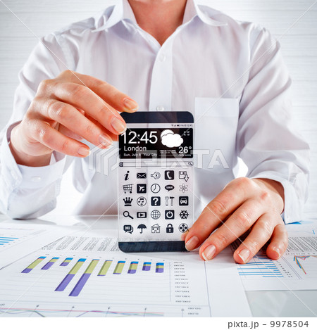 Smartphone with transparent screen in human hands. Smartphone with transparent screen in human hands. 9978504