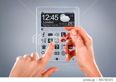 Tablet with transparent screen in human hands. 9978505