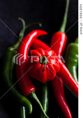 Red and green chili peppers Red and green chili peppers 9981894