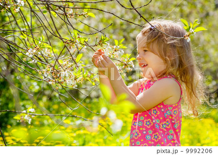 Little girl in the park Little girl in the park 9992206