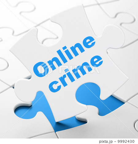 Security concept: Online Crime on puzzle background Security concept: Online Crime on puzzle background 9992430