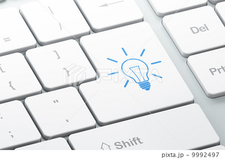 Business concept: Light Bulb on computer keyboard background 9992497