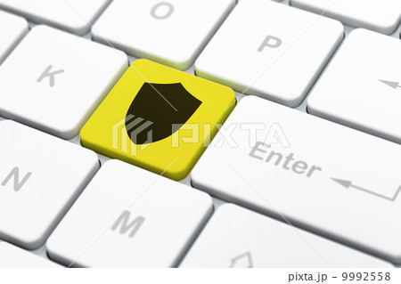 Privacy concept: Shield on computer keyboard background Privacy concept: Shield on computer keyboard background 9992558