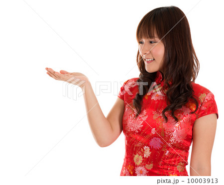 Chinese Cheongsam woman showing something 10003913