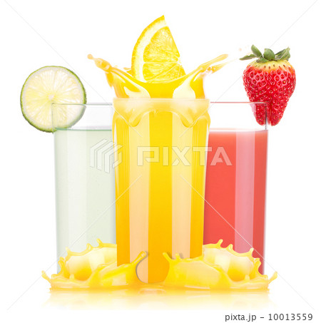 tasty summer fruit drinks in glass with splash 10013559