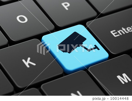 Privacy concept: Cctv Camera on computer keyboard background 10014448