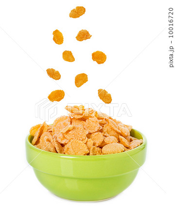 Bowl with corn flakes on the white background 10016720