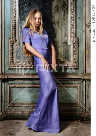 portrait of the beautiful woman blue long gown. 10021707