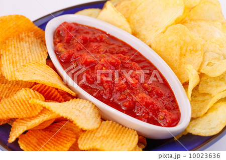 Potato chips and red sauce Potato chips and red sauce 10023636