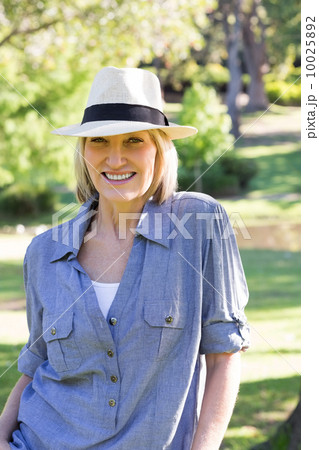 Smiling woman in park Smiling woman in park 10025892