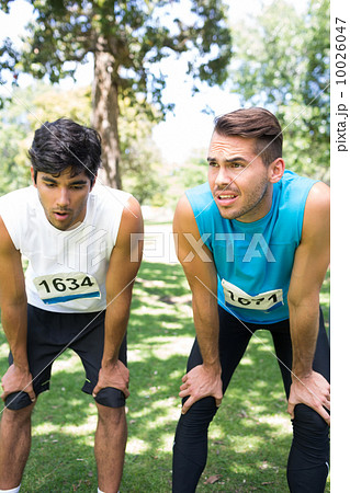 Tired marathon runners 10026047