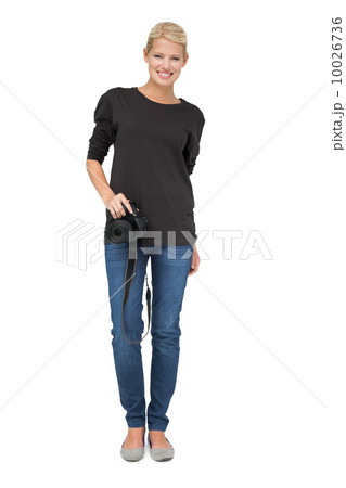 Full length portrait of a female photographer Full length portrait of a female photographer 10026736