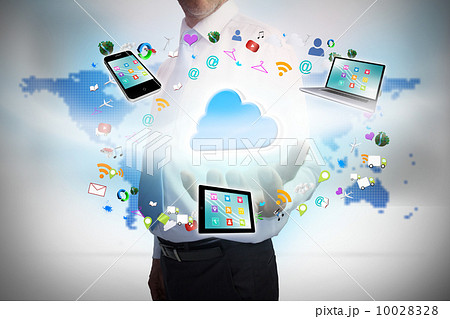 Businessman presenting cloud computing graphic Businessman presenting cloud computing graphic 10028328