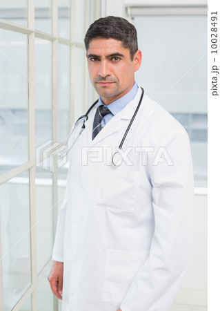 Portrait of a confident male doctor 10028491