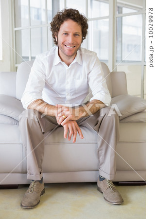 Portrait of a well dressed young man at home Portrait of a well dressed young man at home 10029978