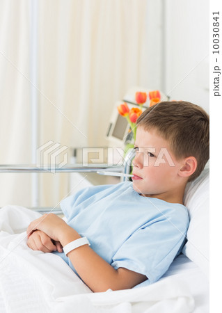 Boy with thermometer in mouth 10030841