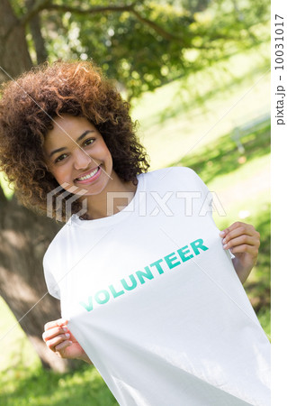 Environmentalist holding volunteer tshirt 10031017
