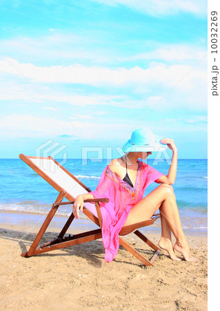 Relaxing on the beach 10032269