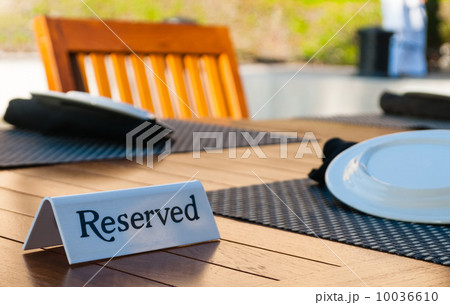Reserved sign on a table 10036610