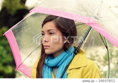 Melancholia - Melancholic woman in rain 10037651