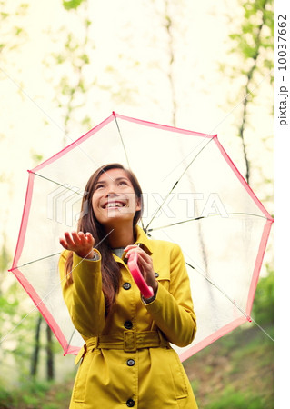 Asian Autumn woman happy after rain under umbrella 10037662