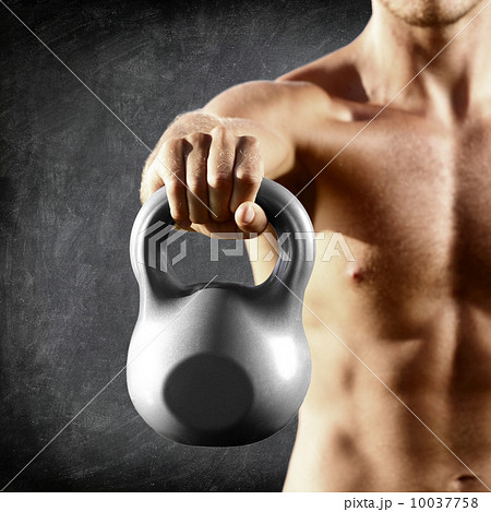 Kettlebell dumbbell - fitness man lifting weight 10037758