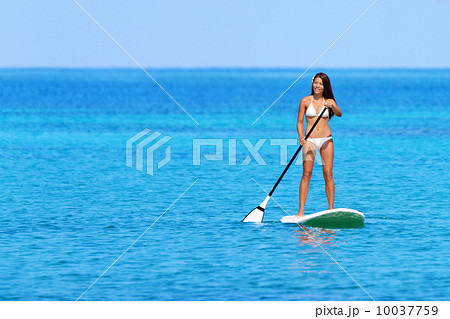 Stand up paddle board woman paddleboarding 10037759